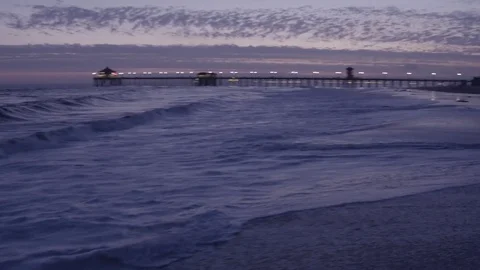 Drone speeds along beach waves Stock Footage 72690691