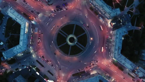 Drone spin over the intersection. Beautiful night lighting. Flight over the city Stock Footage 133322106