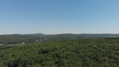 Drone Spinning and Flying over Woods in New England Vídeo Stock 92178683