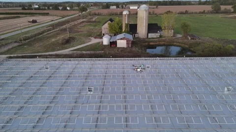 Drone Spraying Greenhouse Stock-Footage 320021356