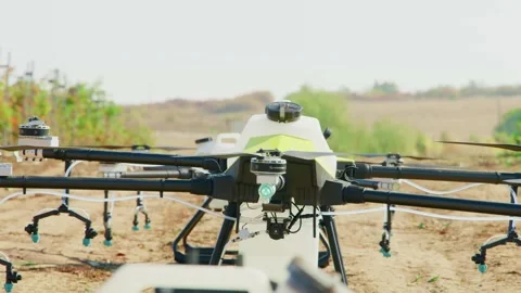 Drone Spraying over Grapevine Field Industrialization Technology Agriculture Stock-Footage 163291475
