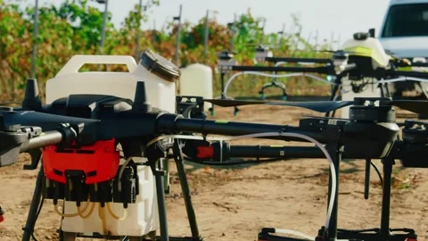 Drone Spraying over Grapevine Field Industrialization Technology Agriculture Stock-Footage 163291655