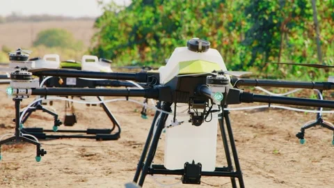 Drone Spraying over Grapevine Field Industrialization Technology Agriculture Stock-Footage 163291801