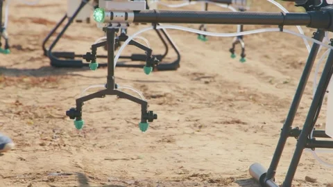 Drone Spraying over Grapevine Field Industrialization Technology Agriculture Stock-Footage 163292368
