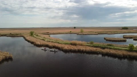 Drone Springtime Canoers in Marsh Stock Footage 199281509