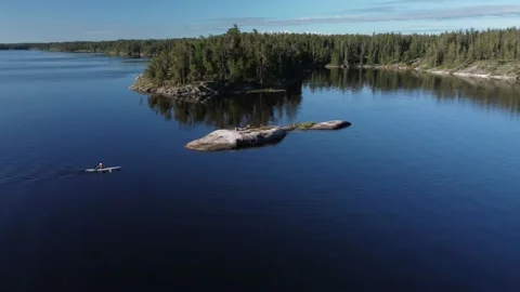 Drone Springtime Summer Kayaker on lake Stock Footage 199306537