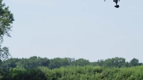 Drone Star r3 enter from top hover 4K Stock Footage 80151744