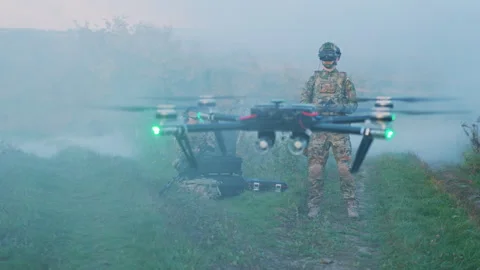 Drone start flying. Soldiers using laptop computer for surveillance during Stock Footage 241011085