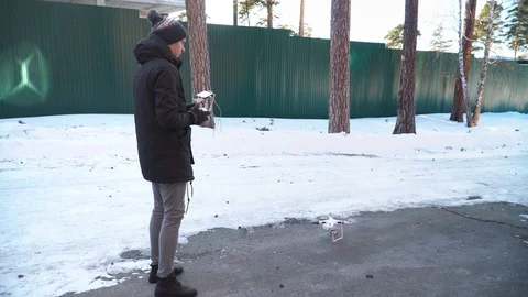 Drone starting its engine and takeoff. Quadcopter Flying Stock Footage 87471516