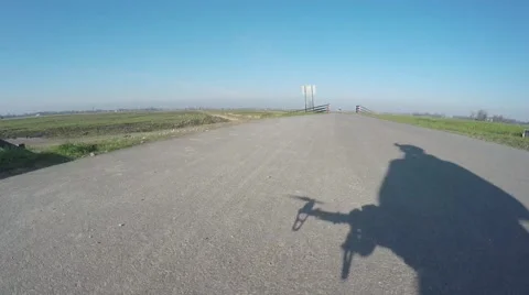 Drone startup moving propellers then moving up into sky showing shadow 4k Stock Footage 60788508