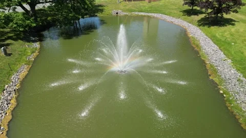 Drone static shot over water fountain 4K Stock Footage 314617678