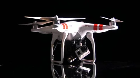 Drone stationary, startup engine and lights running, dark background Stock Footage 53620150