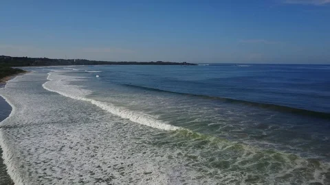 Drone stationary view of waves rolling in Playa Grande Stock Footage 91011307