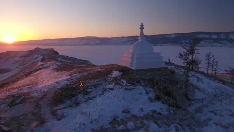Drone Stupa of Enlightenment, sacred Buddhist symbol and place of power Baikal Stock Footage 317963521