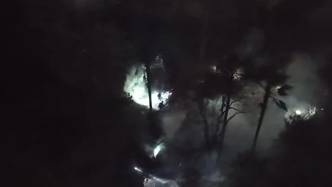 Drone: Suburban Riverbed Brush Fire Fought After Dark Stock Footage 327577075