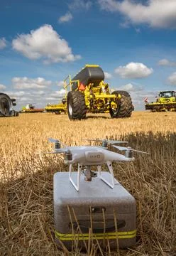 Drone on a suitcase box ready to work in the field, agriculture, Stock Photos