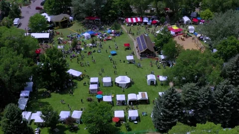 Drone:  Summer Community Fair in Small Town Park Stock Footage 157767732