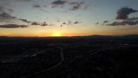 Drone of sun falling over the San Fernando Valley Stock Footage 87754861