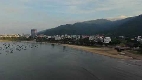 Drone Sunrise Flight Along Da Nang Bay and Mountain Coastline Stock Footage 340487365