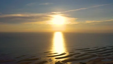 Drone Sunrise Over Cape Cod Beach Low Tide With Braided Channels and Pastel Sky Stock Footage 325781290