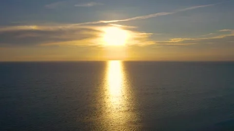 Drone Sunrise Over Cape Cod Beach With Boat at Low Tide and Golden Reflection Stock Footage 325781784
