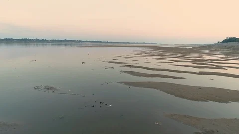 Drone sunrise sunset view river and sandbanks in the river. Stock Footage 128405111