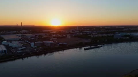 Drone Sunset Flight Over Rhine River with Barge in Cologne Niehl Nord Germany 스톡 동영상 312526977