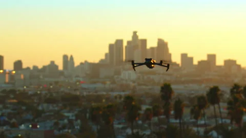 Drone in the sunset light flies to the skyscrapers in downtown Los Angeles Stock Footage 227861353