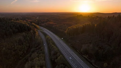 Drone Sunset light Hyperlapse forward movement above speedway Video stock 244980142