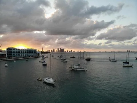 Drone sunset over the bay with views of boats and a bridge Stock Photos