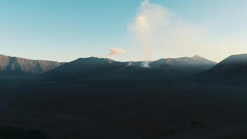 Drone sunset over Mount Bromo and erupting Semeru volcano, East Java Indonesia Vidéo 334775090