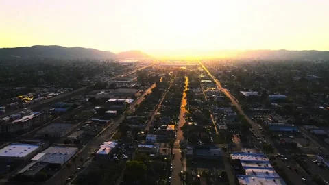 Drone of a Sunset over Town Stock Footage 176010164