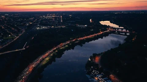 Drone Sunset Over Urban River Bridge in Philadelphia Schuylkill Boathouse Row Stock Footage 281676220