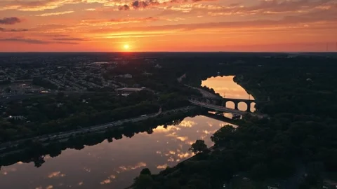 Drone Sunset Over Urban River Bridge in Philadelphia Schuylkill Boathouse Row Stock Footage 281676238