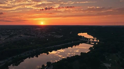 Drone Sunset Over Urban River Bridge in Philadelphia Schuylkill Boathouse Row Stock Footage 281676239