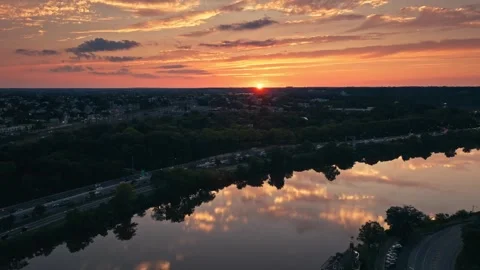 Drone Sunset Over Urban River Bridge in Philadelphia Schuylkill Boathouse Row Stock Footage 281676242