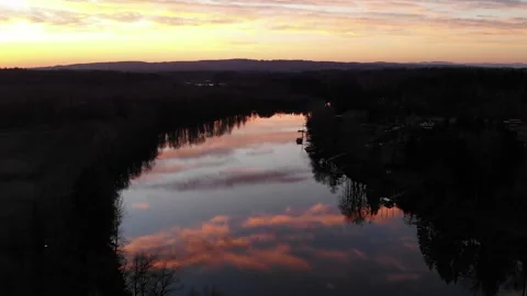 Drone Sunset Reflection Over Still River Vídeos de archivo 328382809