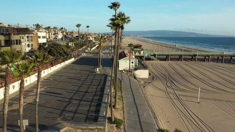 Drone sunset shot of empty Manhattan Beach during Corona Pandemic Video stock 127610243