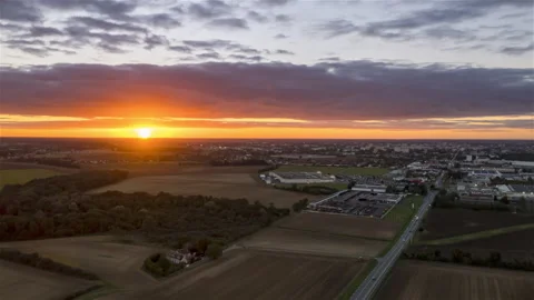 Drone Sunset Timelapse above Châteauroux City, with some cars light trafic Stock Footage