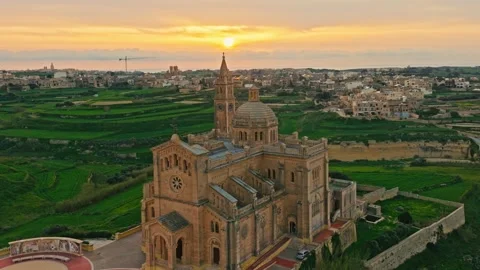 Drone sunset view of catholic Ta' Pinu church on Gozo island, Malta Video stock 330063553