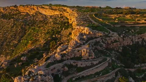 Drone sunset view of cliffs, countryside. Malta Stock Footage 324801000