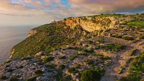 Drone sunset view of countryside, rocks, hills. Dingli cliffs, Malta island Vídeos de archivo 324800209