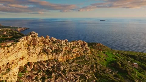 Drone sunset view of countryside, rocks, hills. Malta island Stock Footage 324800222