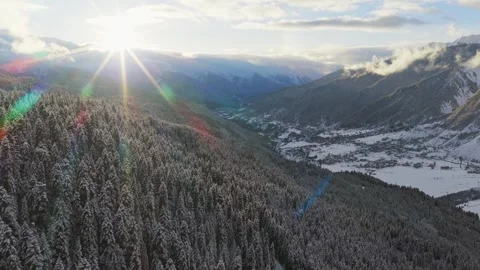 Drone sunset view over Mestia Svaneti valley snow covered forests villages .. Stock Footage 328371631