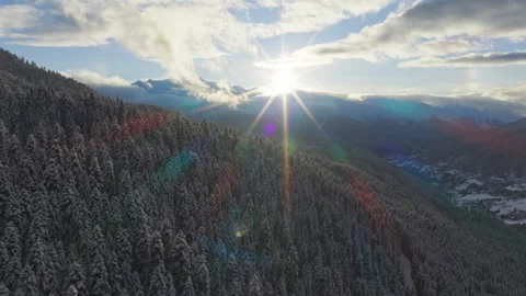 Drone sunset view over Mestia Svaneti valley snow covered forests villages .. Stock Footage 328409392