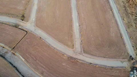 Drone survey captures many empty residential plots Stock Footage 302150777