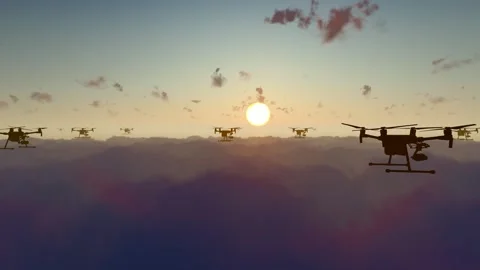 Drone swarms fly across the clouds Stock Footage 318564825
