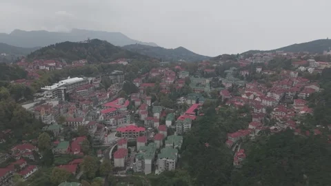 Drone Sweeping over Sprawling Red Roof Mountain Town, Lushan Video stock 346699962