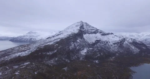 Drone  sweeping towards a mountain peak Stock Footage 123296517