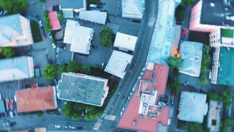 Drone swoops down spinning around its axis. Stock Footage 108231636